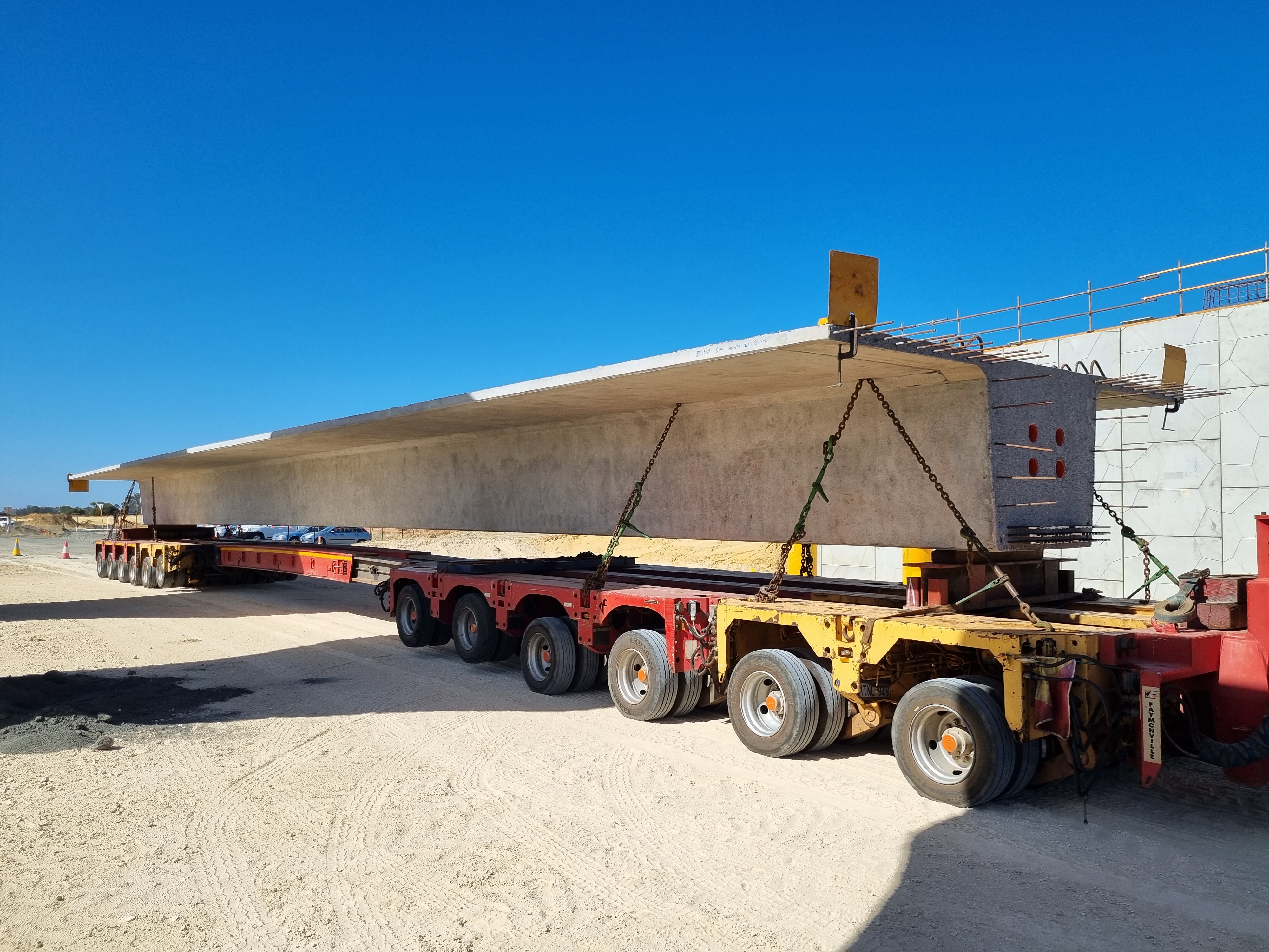 BORR 290224 - Precast bridge beam on a straddle carrier