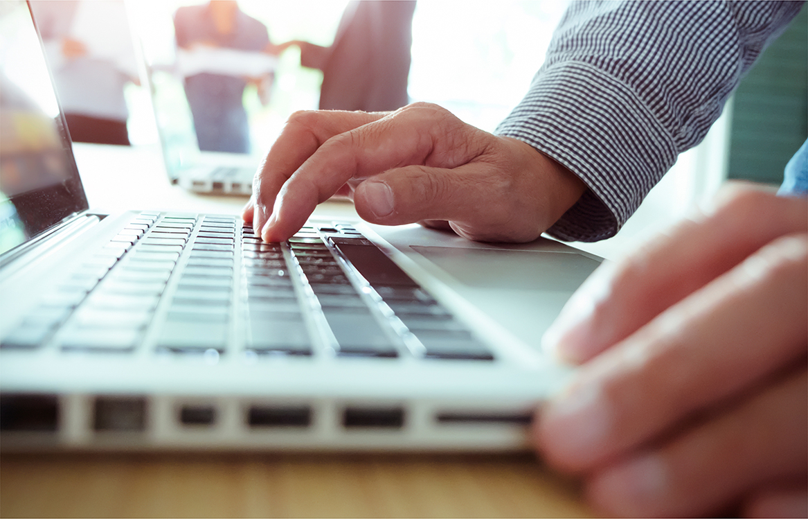 Typing on a laptop keyboard