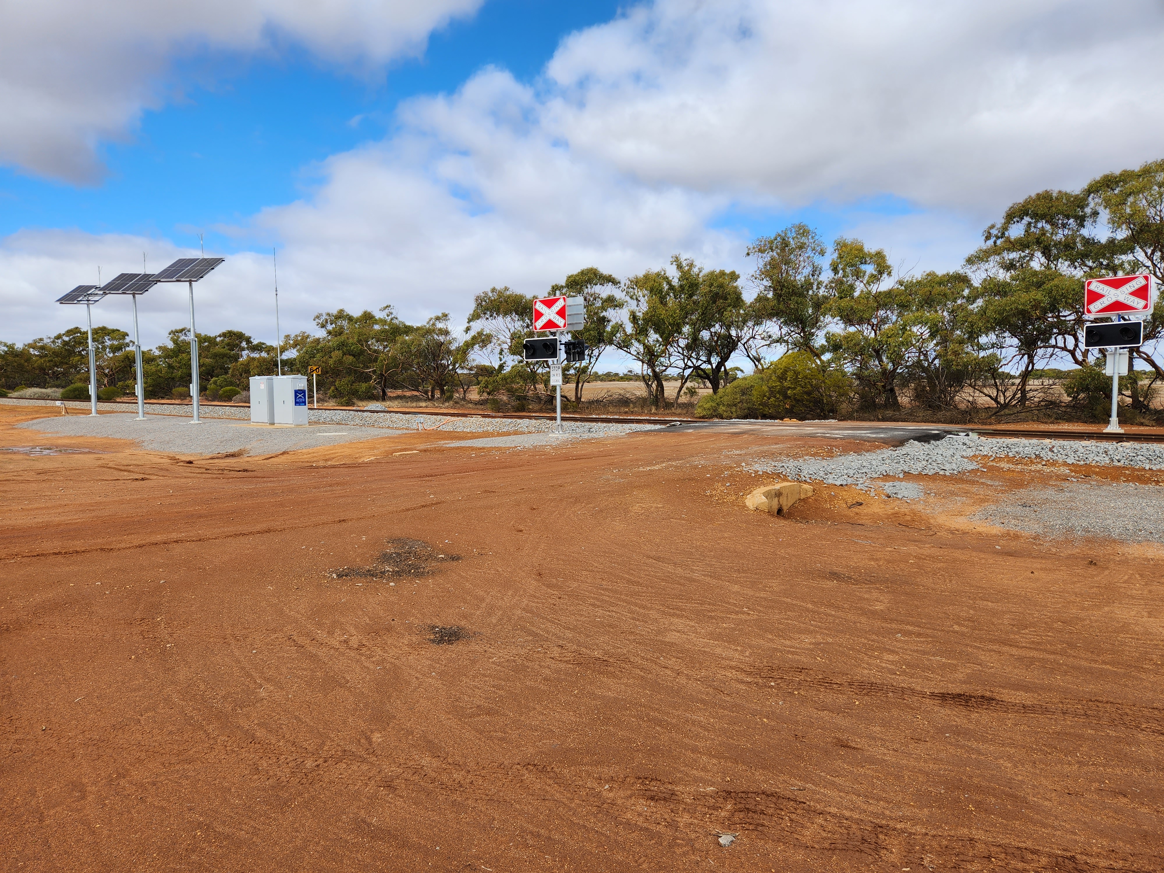 level crossing with flashing lights.