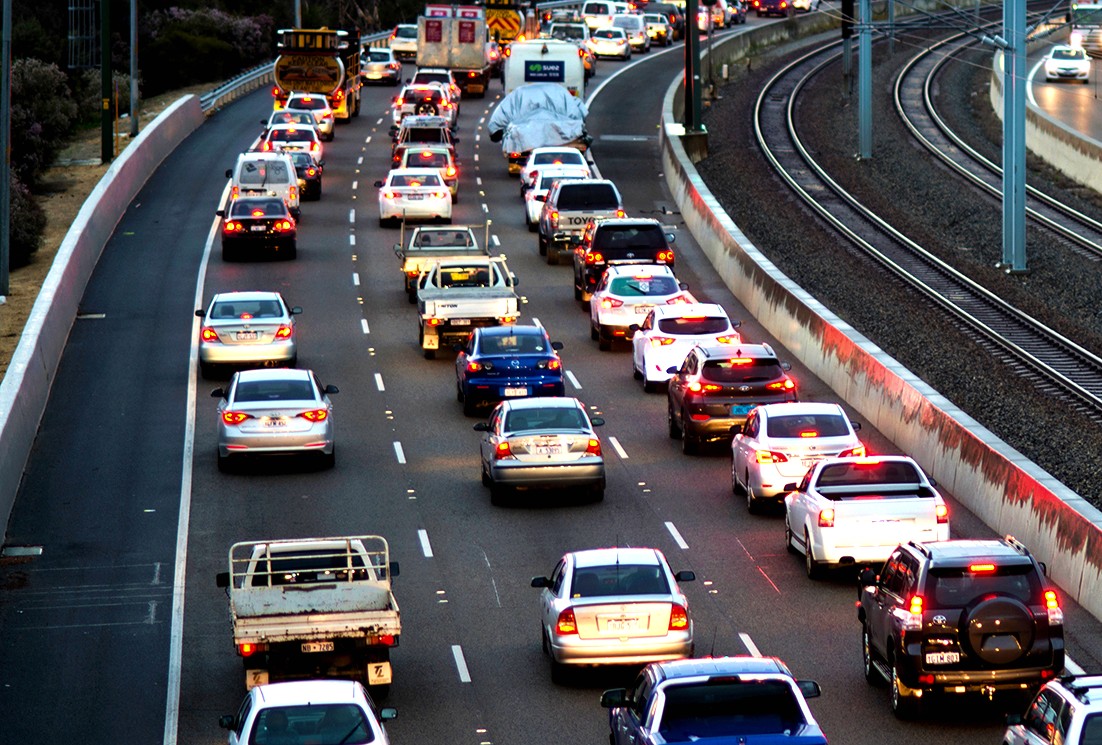Cars sitting in traffic on the highway