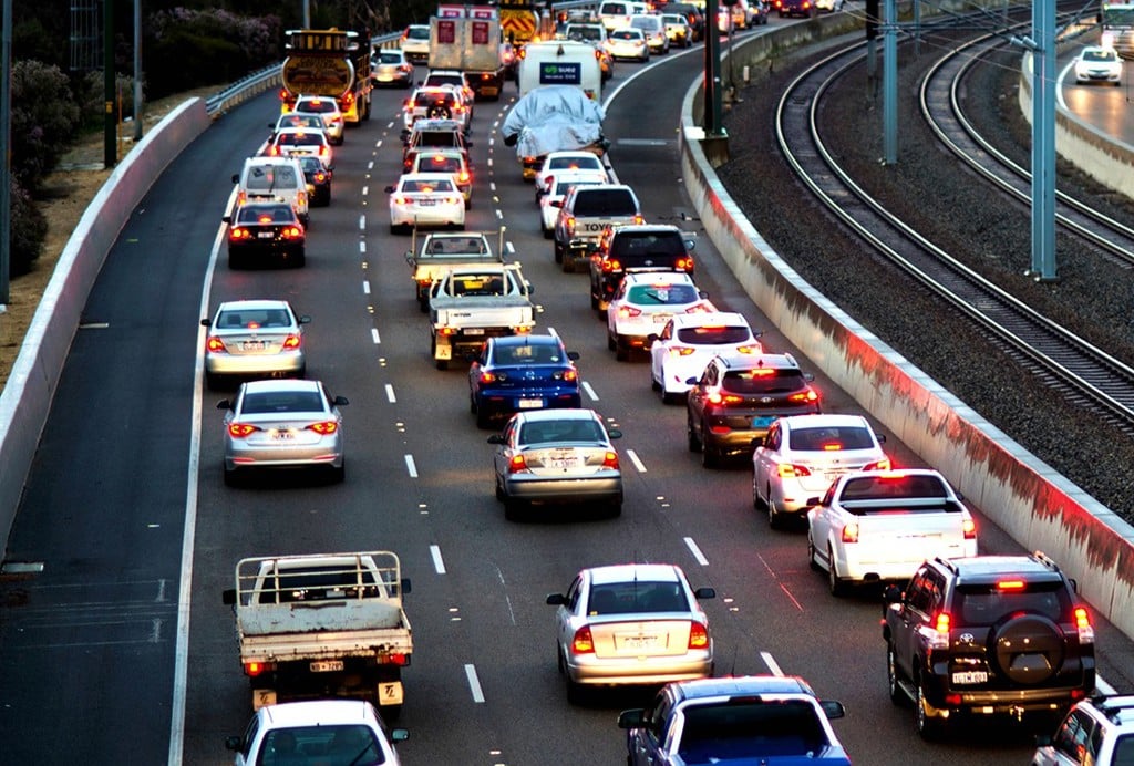 Cars sitting in traffic on the highway