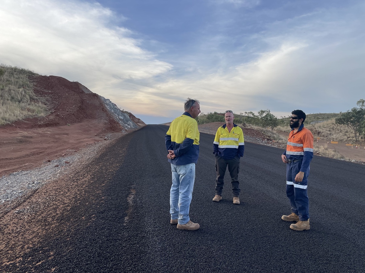 Tanami Road Project Team debrief the fresh seal on Tanami Road SLK 33