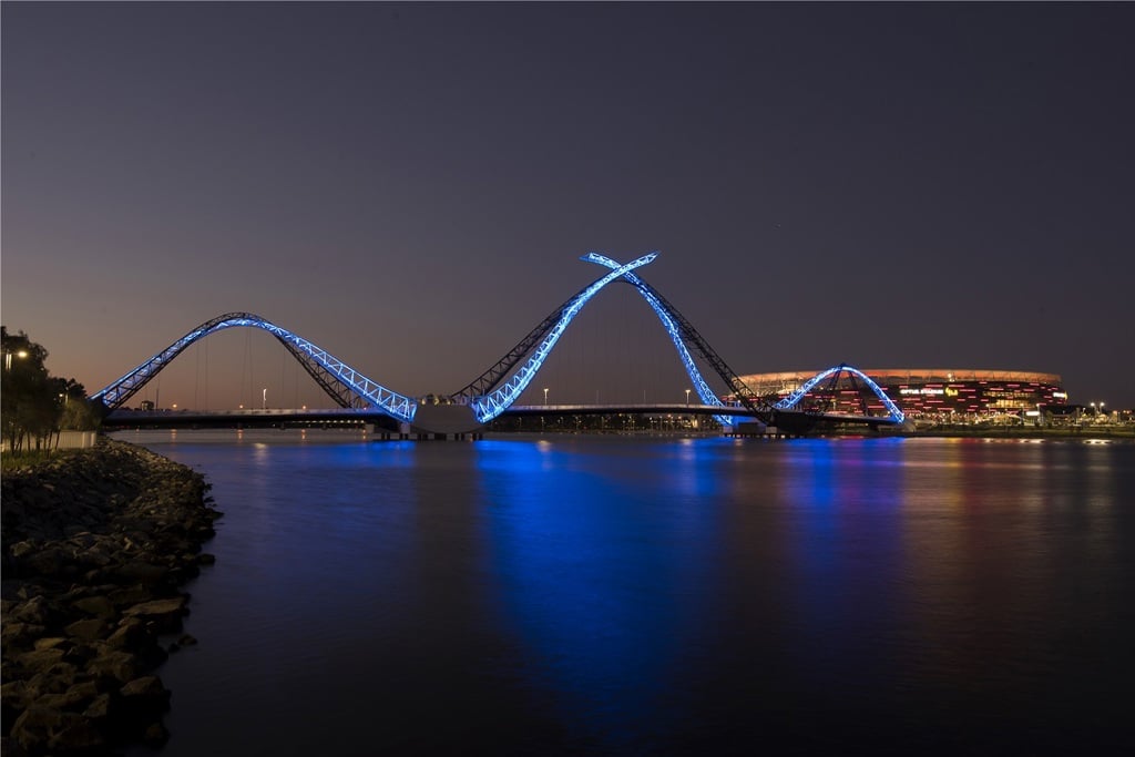 Matagarup bridge light up in blue at night
