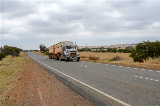 Truck driving along Geraldton Mt Magnet Road