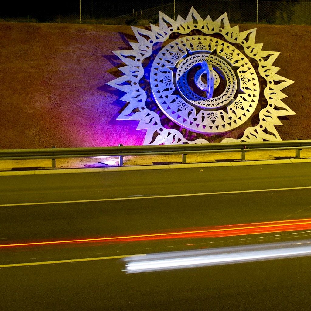 Public art of a mandala on the side or road