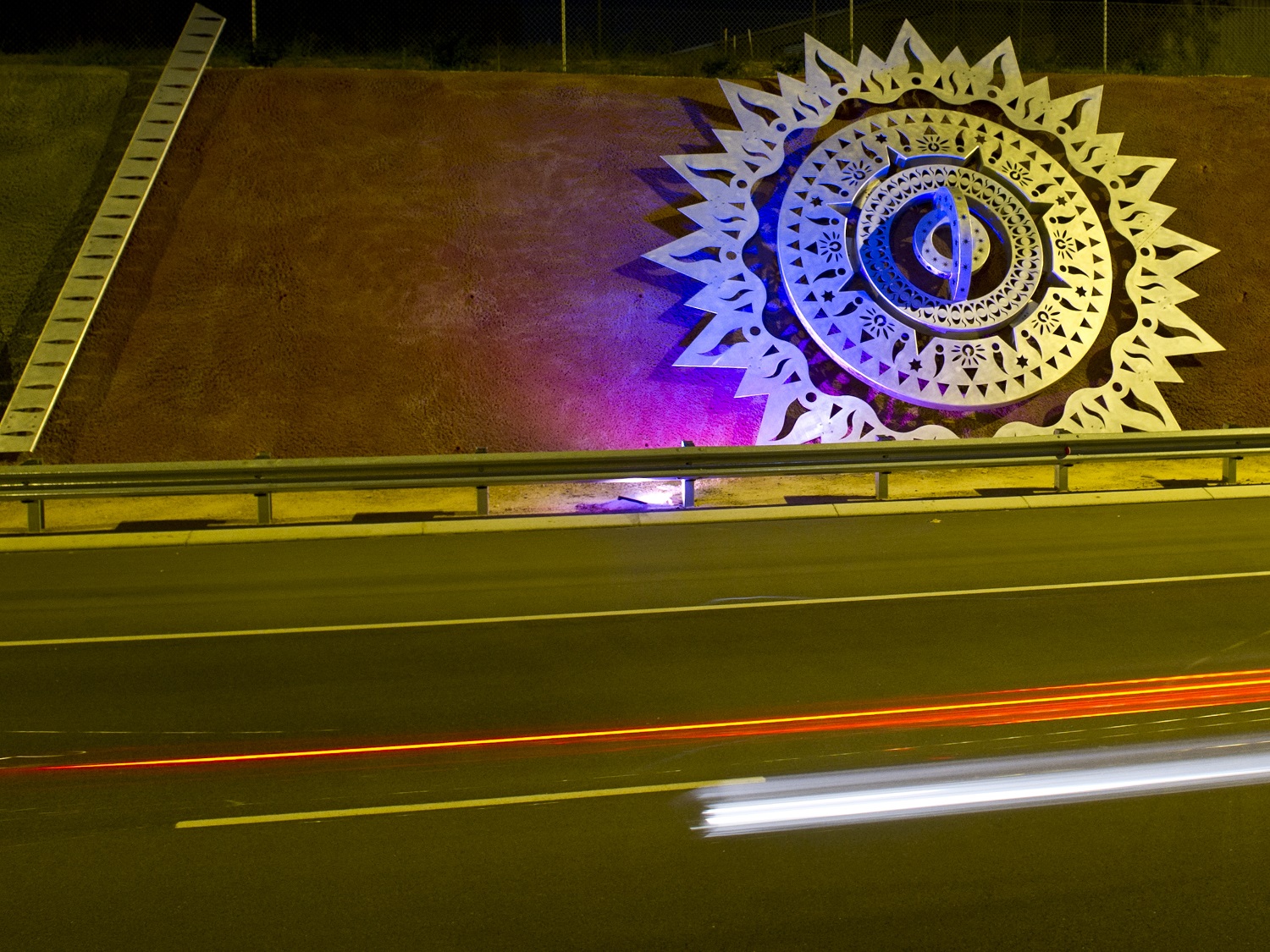 Public art of a mandala on the side or road