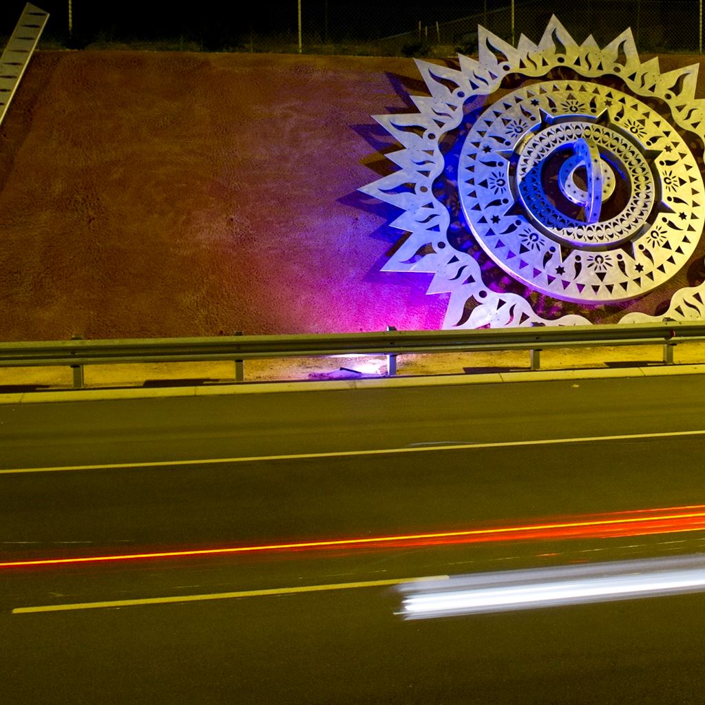 Public art of a mandala on the side or road