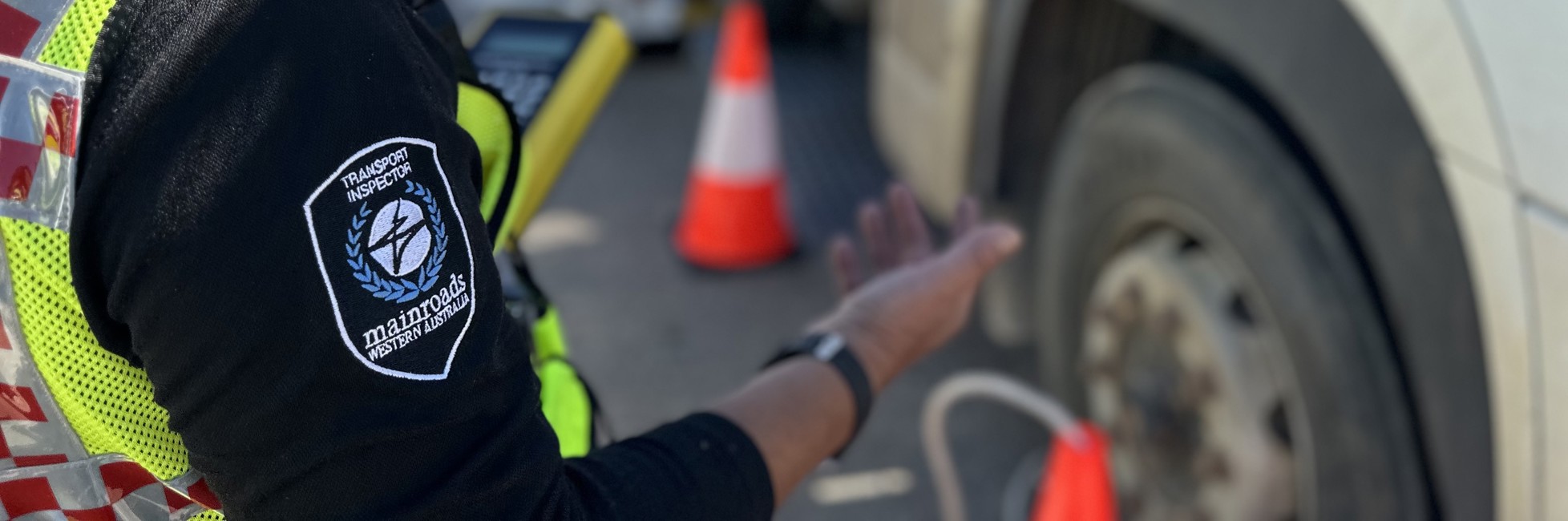 Main Roads Transport Inspection Officer inspecting a heavy vehicle