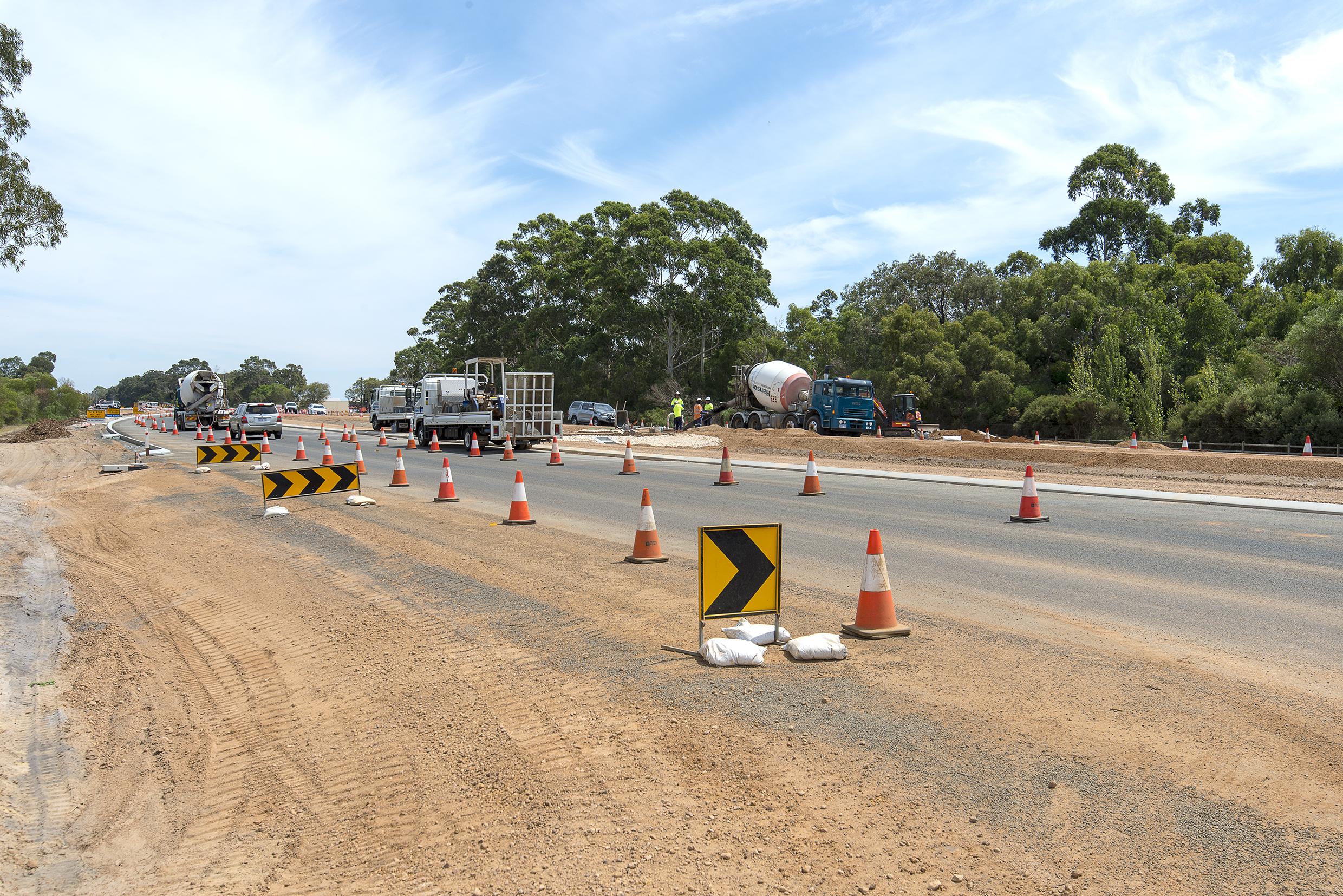 Construction site on Bussell Highway with roadworks signs and cones