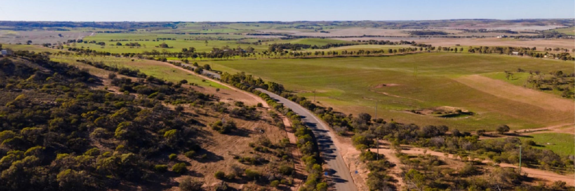 Regional road near hills and fields