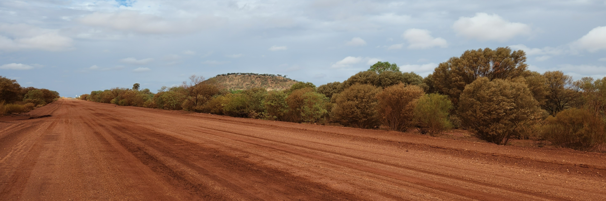Photo of regional road, red dirt