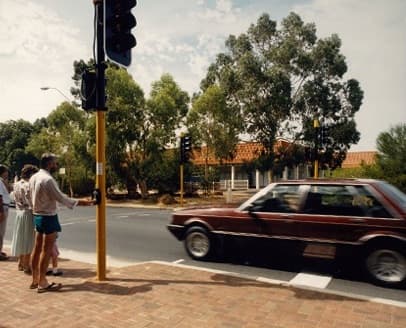 Pedestrian controlled mid-block traffic crossing